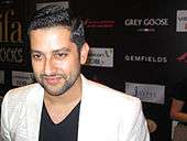 Aftab Shivdasani smilesf for the camera
