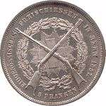 Rifles crossed over the Swiss Cross. The Swiss Cross is surrounded by rays encircled by a wreath of oak and laurel. Surrounded by legend and denomination.