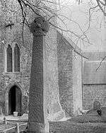 Celtic cross situated in the churchyard at St Nicholas and St Teilo's church, Penally.jpg