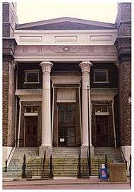 Photograph of the front steps, doors, and façade of Old First Presbyterian Church, showing Egyptian revival details.