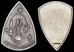 Gemini 11 mission emblem and crew names (front). Flight dates (back)