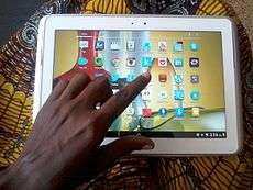 A Ghanaian using a Tablet computer