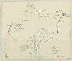A hand-drawn map depicting Ford Island with three sections drawn in a larger scale. Clear tape covers parts of the map.