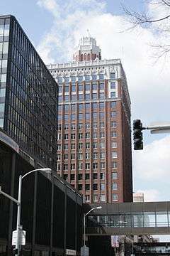 Photograph of the Equitable Building, a downtown, high-rise office building with a Gothic cupola penthouse