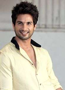 Shahid Kapoor is smiling at the camera.