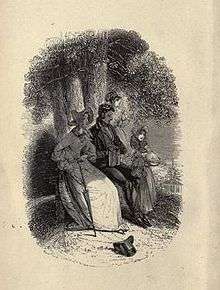 A woman, a man, and a child sit outside on a wall under trees, with water in the background.