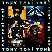 A group of four pictures is bordered by a black background with the name "Tony Toni Toné" written four times in blue. The upper right corner photo of the group of pictures is a black and yellow image of a man in a hat and sunglasses. The upper left corner photo depicts a white house with a dark blue sky and a blue window. The lower left photo contains a red an black image of a man with sunglasses and dreadlocks. The lower right corner photo depicts a man in a black suit and gloves with white circles on them. He is seated in front of a piano that is facing the viewer. In the center of the photo, a circle contains the phrase "Sons of Soul".