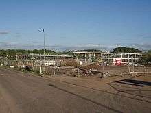 View of construction site and partially built school