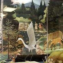 A mural depicting a large bird and other wildlife